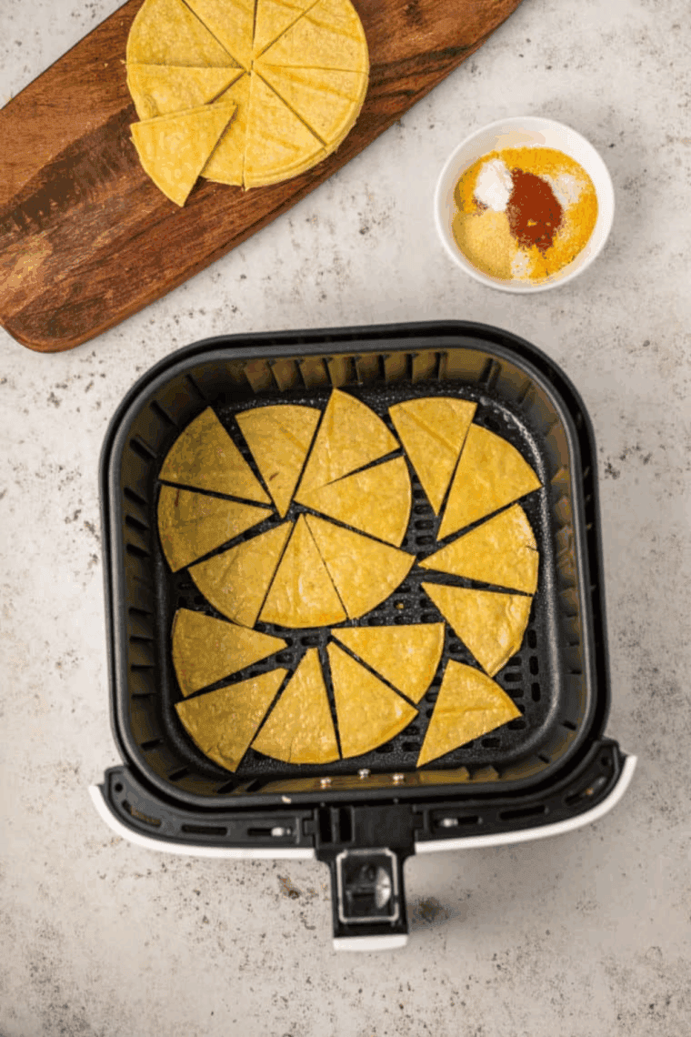 Cool Ranch Doritos in the air fryer basket.
