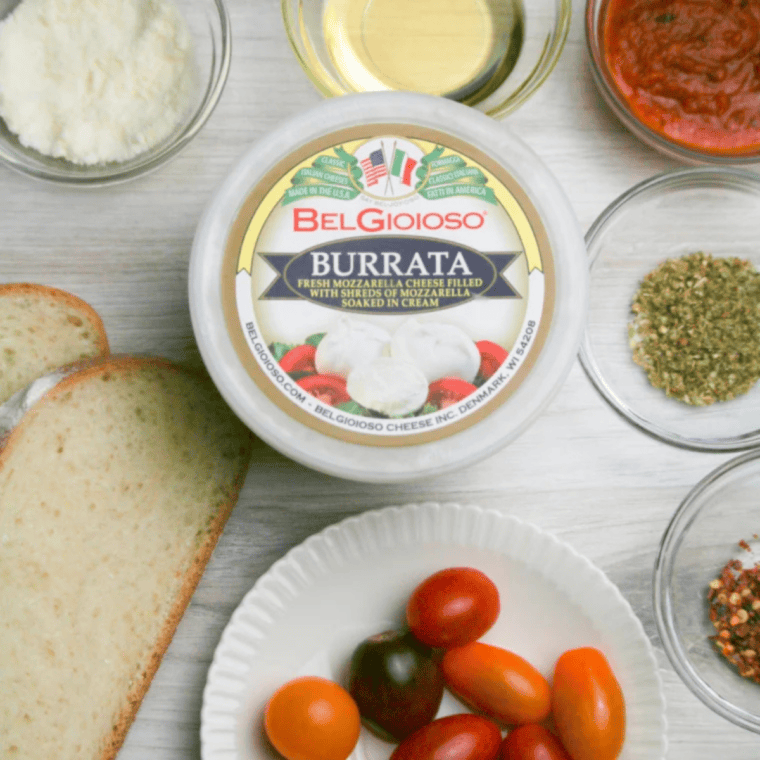 Ingredients needed for Air Fryer Burrata Pizza on kitchen table.