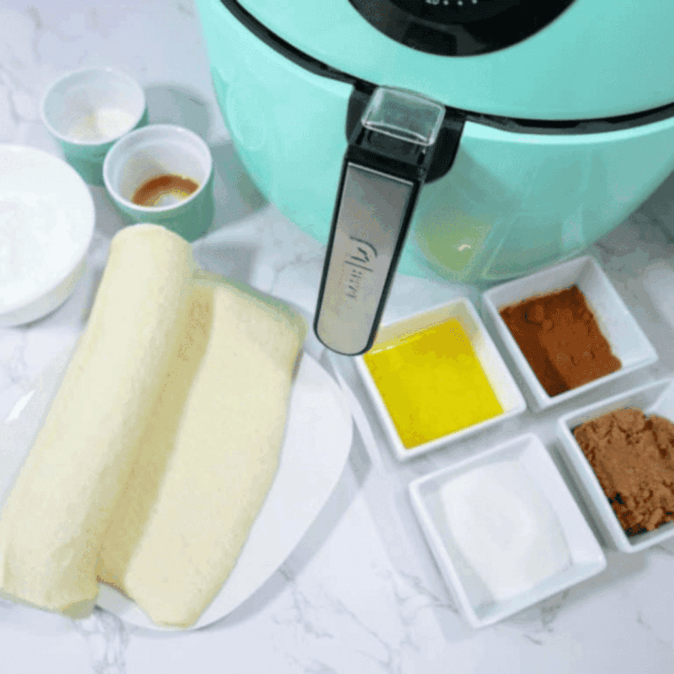 Ingredients needed for Air Fryer Copycat Pizza Hut Cinnamon Sticks on kitchen table.