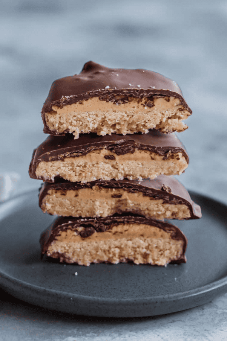 Homemade air fryer Tagalongs with peanut butter and chocolate on a wire cooling rack.