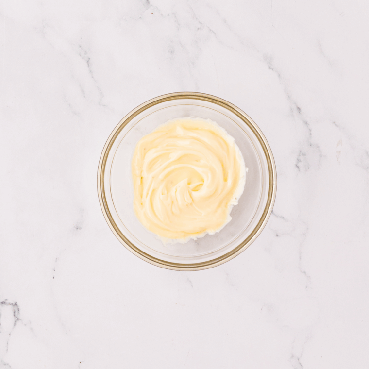 Bowl of Copycat Sonic Blackened Mayo Recipe on kitchen table.