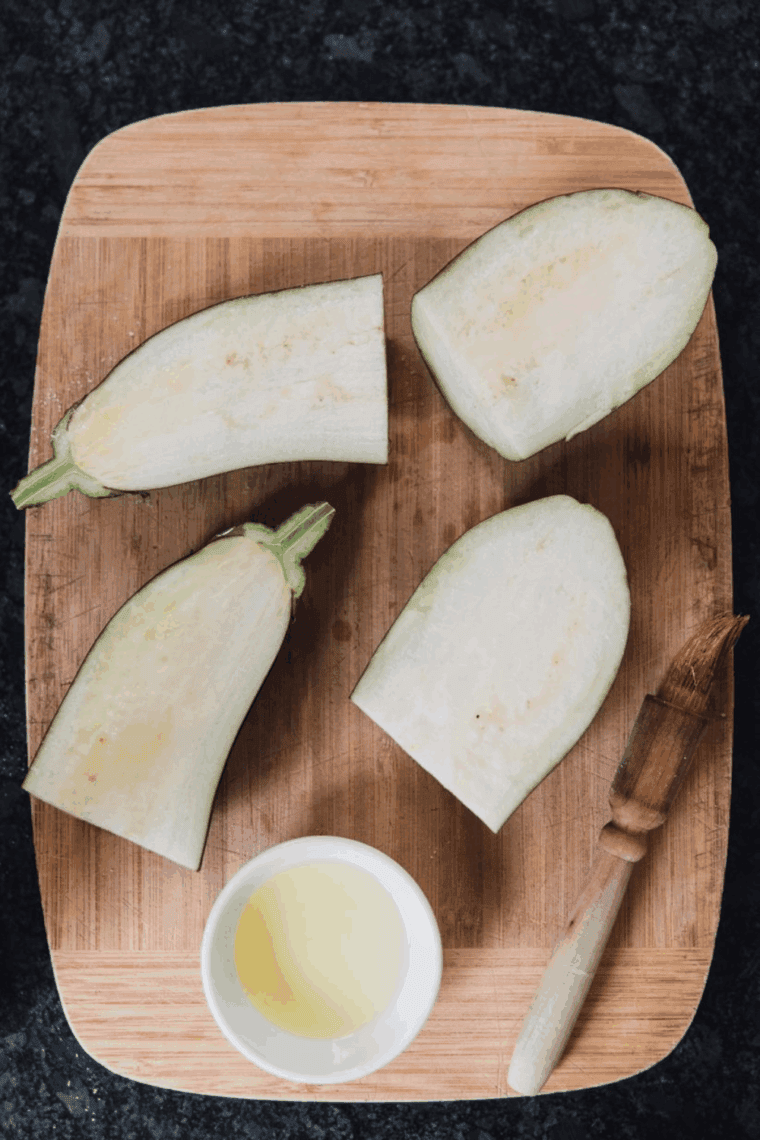 Preheating the air fryer to 400&deg;F and brushing eggplant halves with olive oil before roasting