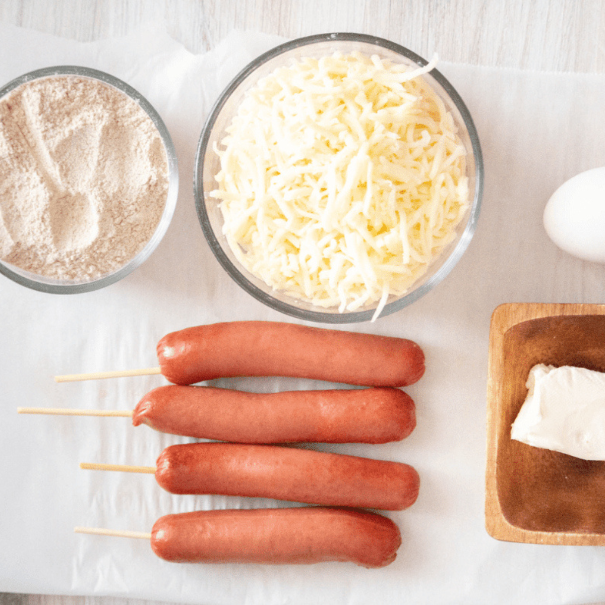 Ingredients Needed For Keto Air Fryer Corn Dogs on kitchen table."