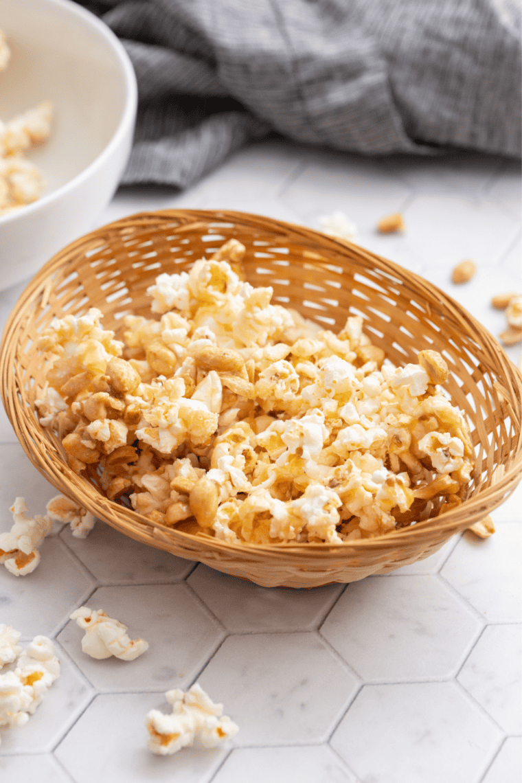 Close-up of homemade Buc-ee's-style kettle corn showing the thin, crackly sugar coating on each piece