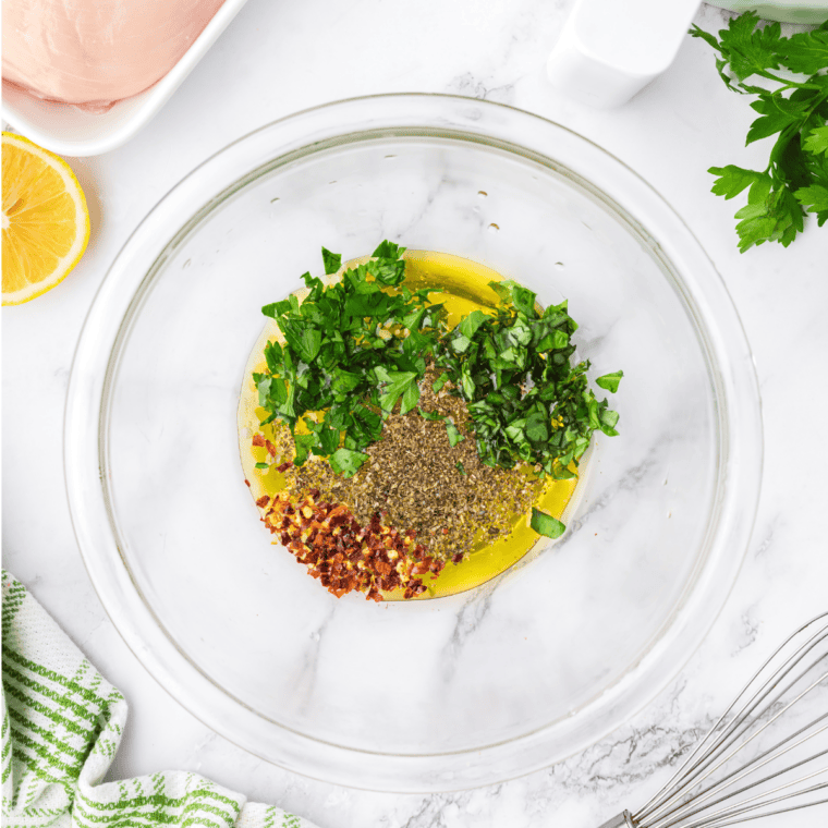 Homemade Carrabba's copycat grill seasoning mixed in a small glass bowl