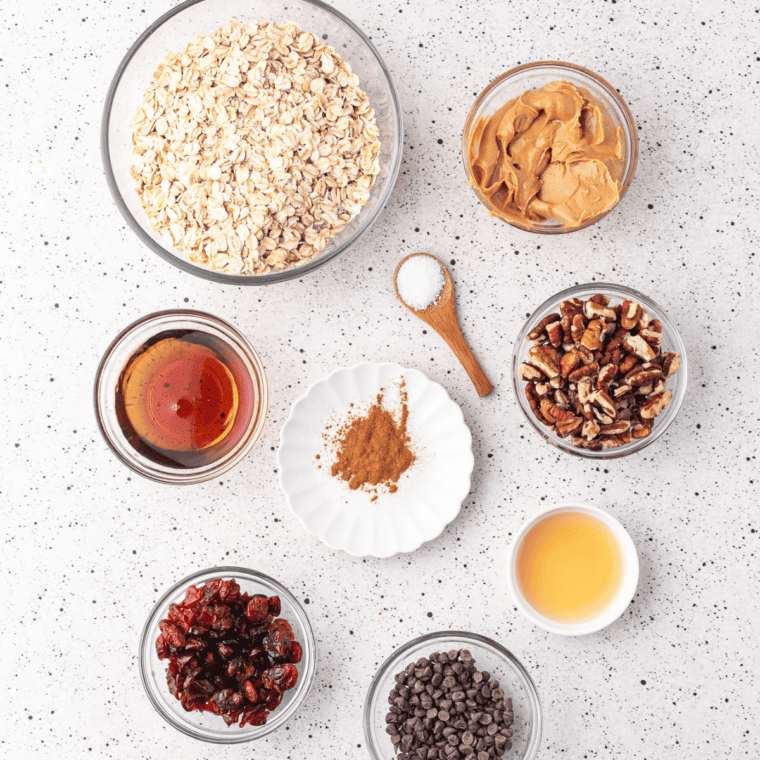 Ingredients for copycat Nature Valley Protein Granola including oats, peanut butter, honey, and protein crisps