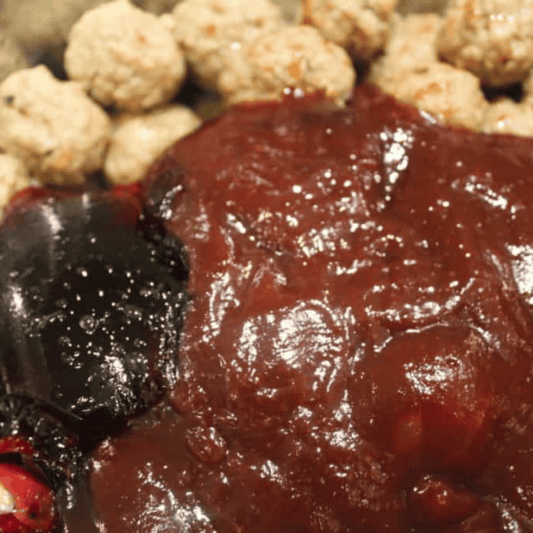 Cranberry chili sauce meatballs in an Instant Pot after thickening on Sauté