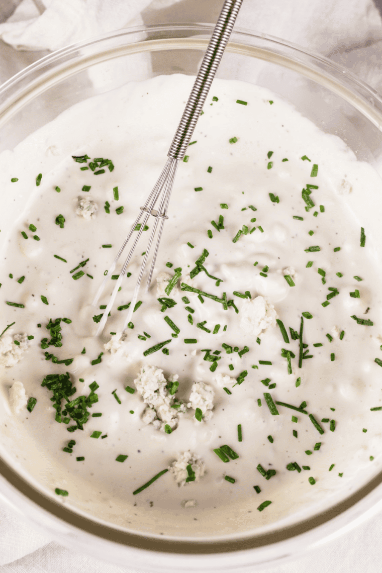 . Sour cream, buttermilk, garlic, and chives stirred into mashed blue cheese