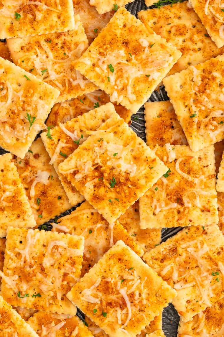 Copycat Buc-ee's ranch crackers on a snack board with pepper jack cheese and summer sausage