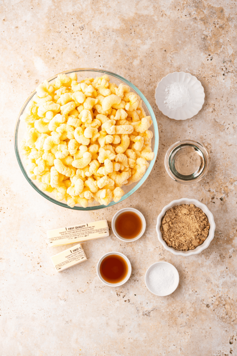 Ingredients for copycat Beaver Nuggets: puffed corn, butter, brown sugar, corn syrup, baking soda, vanilla, and maple extract