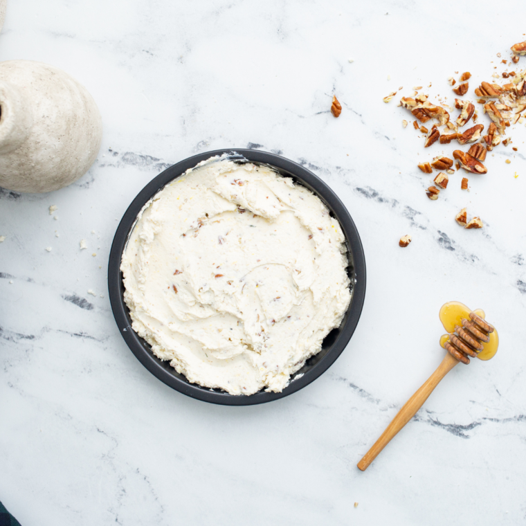 Softened cream cheese and butter in a mixing bowl ready to beat for sweet pretzel dip