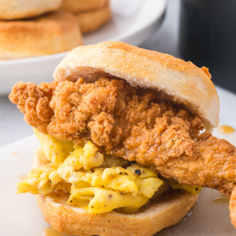 Hardee's honey butter chicken biscuit with honey butter spread on a warm biscuit and crispy chicken