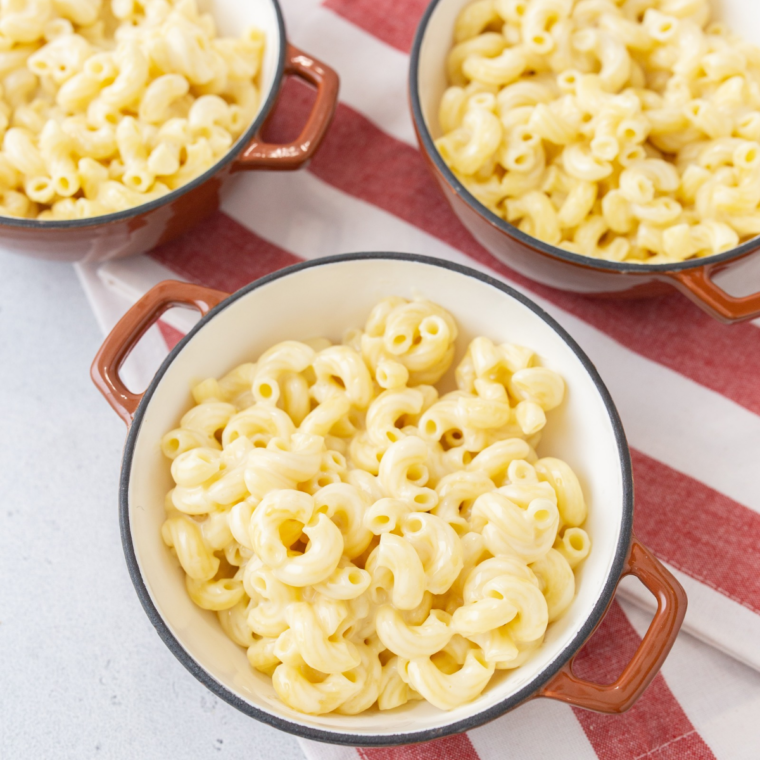 Close-up of elbow macaroni coated in silky Wisconsin cheddar sauce