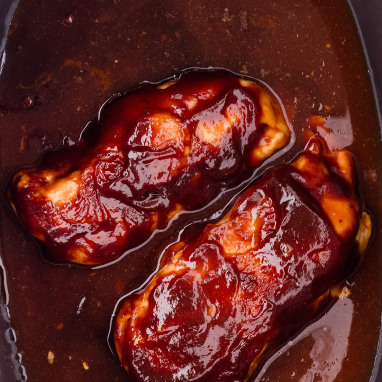 Bubbling, caramelized barbecue glaze on chicken breasts fresh out of the air fryer