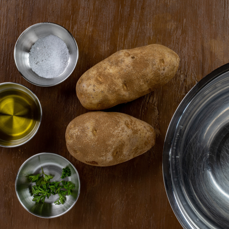 Ingredients for copycat Buc-ee’s Beaver Chips including russet potatoes, oil, and fine sea salt. If the mandoline or a dish is in the shot, say so and I’ll fold it in.