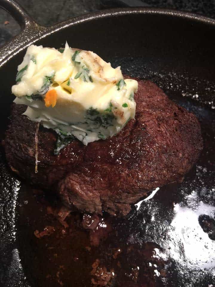 Cast IronPanSeared Steak with Garlic and Herb Butter Sauce