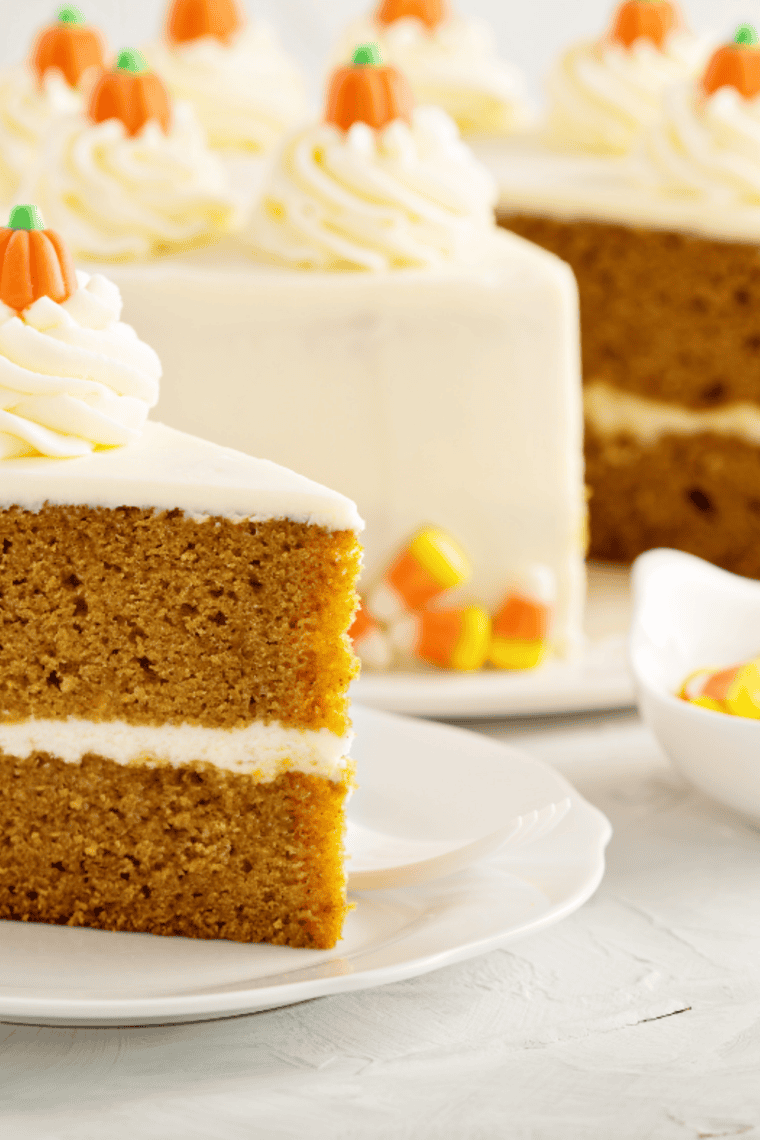 Pumpkin cake made with Copycat McCormick Pumpkin Pie Spice on a kitchen table.
