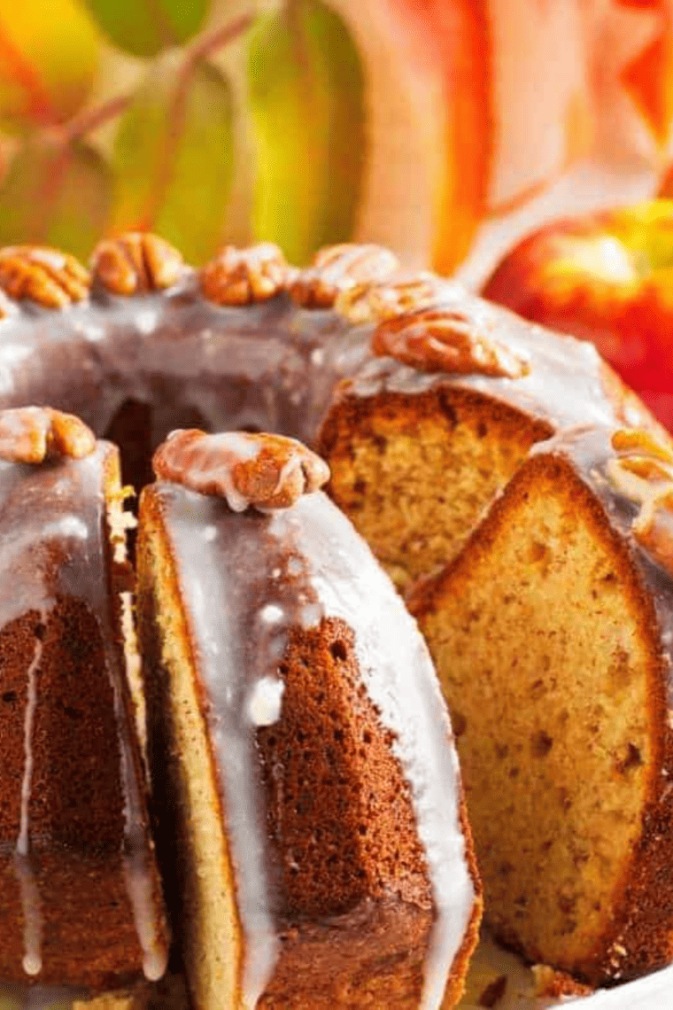 Instant Pot banana pecan bundt cake with moist banana crumb and crunchy pecans served as homemade dessert slice