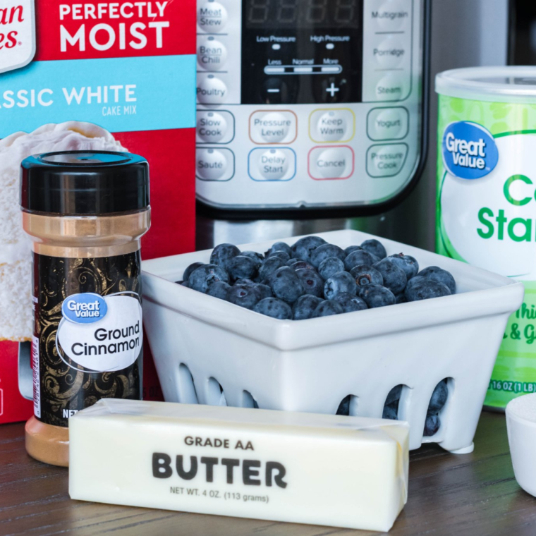 Ingredients needed for Instant Pot Blueberry Cobbler on table, with instant pot in back.