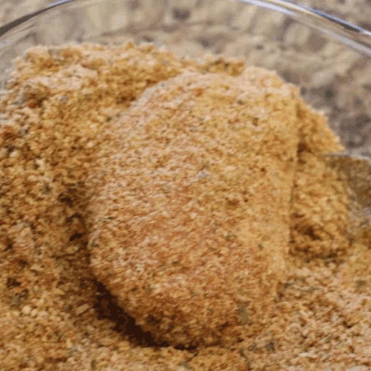 Using the homemade Shake And Bake Copycat Recipe to coat the pork chops.