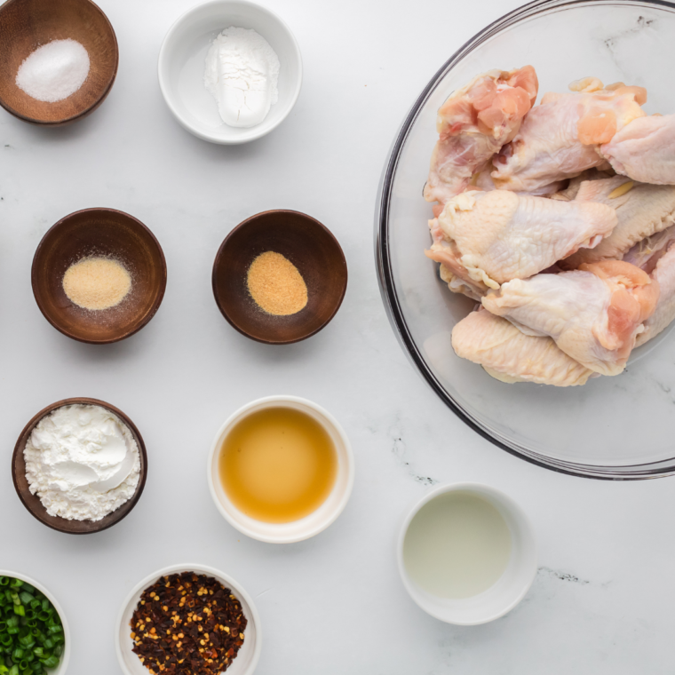 Ingredients needed for Chinese chicken wings on kitchen table.