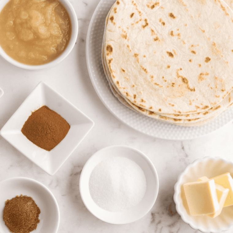 Ingredients needed for Air Fryer Cinnamon Tortilla Chips on kitchen table.