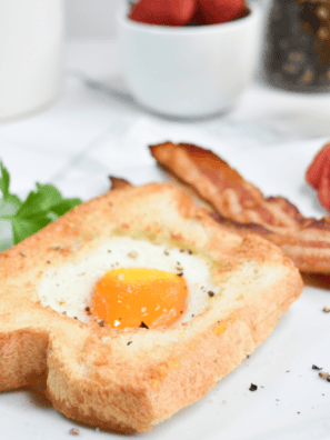 Start your day with a fun twist on breakfast! Air Fryer Egg In A Hole is a quick, delicious way to enjoy a crispy toast with a perfectly cooked egg in the middle. It's easy, customizable, and perfect for busy mornings!