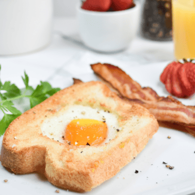 Start your day with a fun twist on breakfast! Air Fryer Egg In A Hole is a quick, delicious way to enjoy a crispy toast with a perfectly cooked egg in the middle. It's easy, customizable, and perfect for busy mornings!