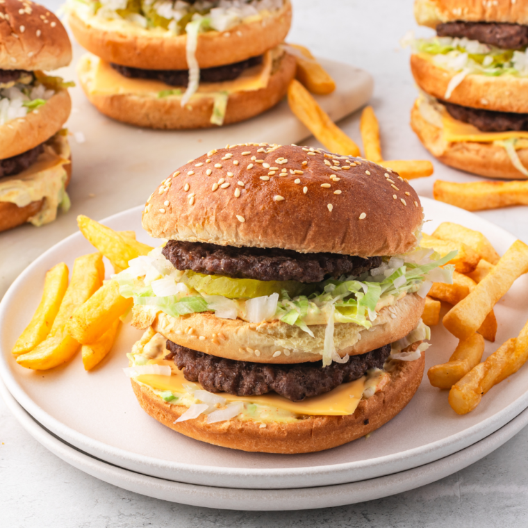 Big Mac with two beef patties, cheese, lettuce, pickles, and special sauce in a sesame seed bun.