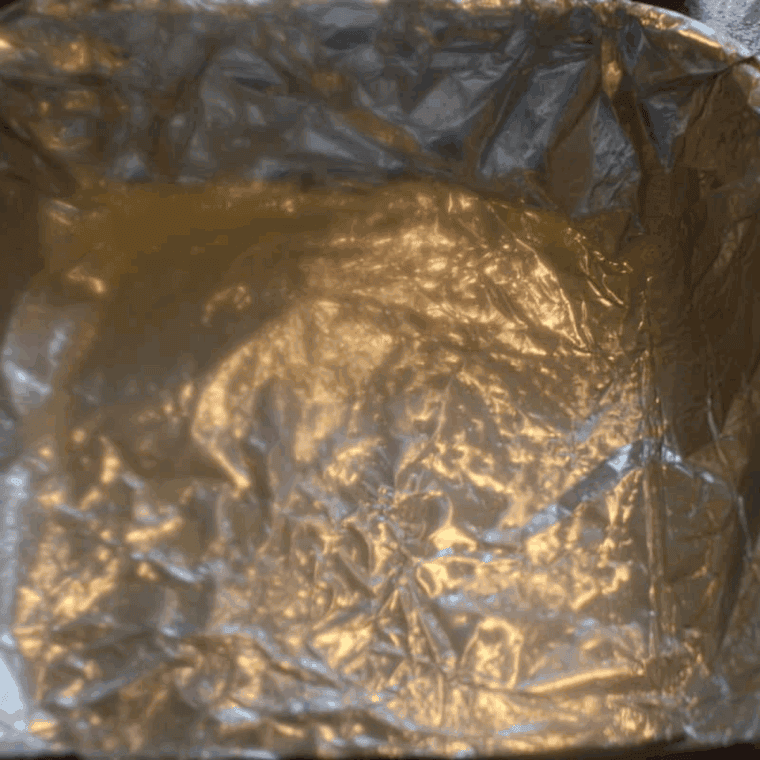 Wrap the baking pan with foil.