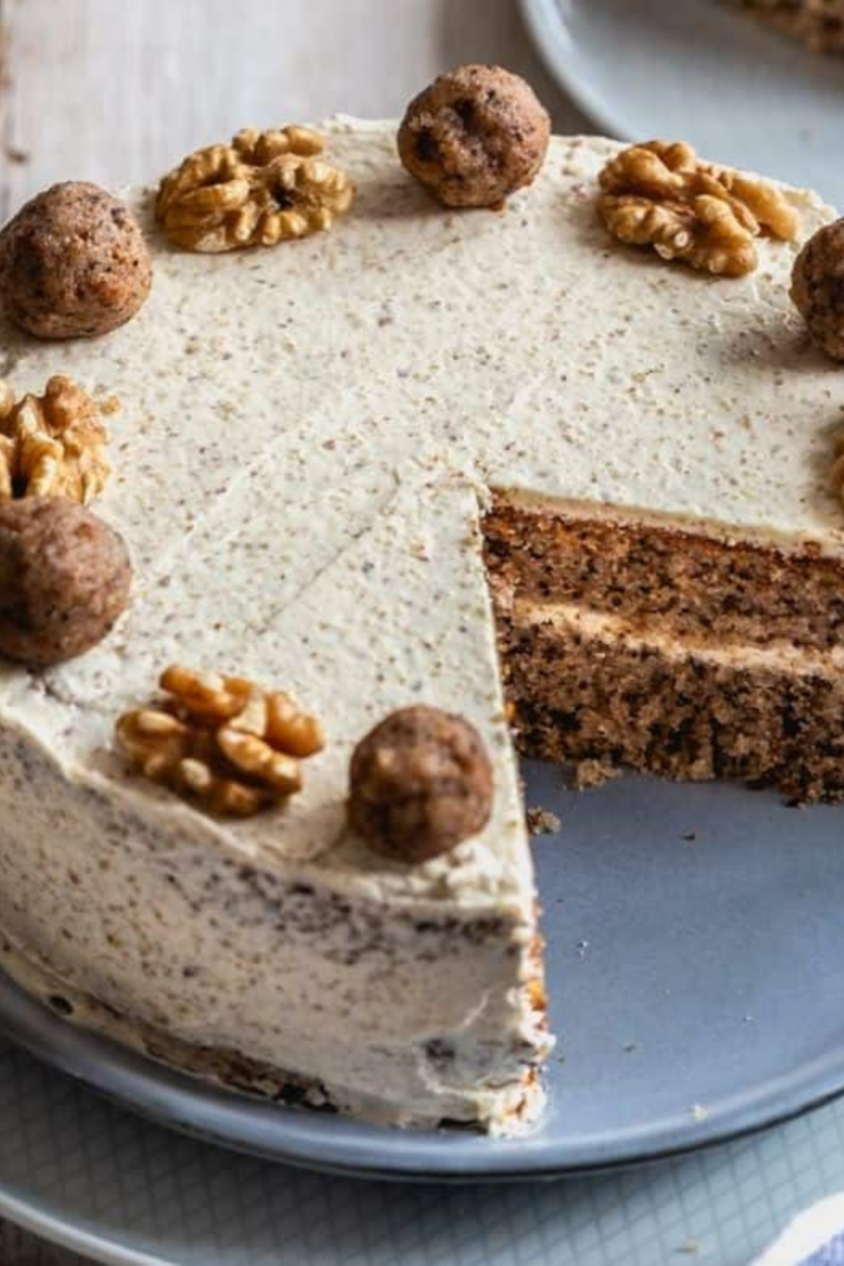 Moist and fluffy Instant Pot box cake made from cake mix sliced on plate with soft texture and frosting topping