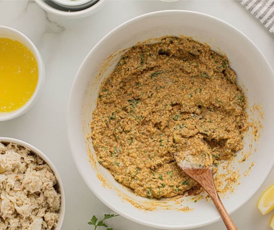 Ingredients for making air-fried crab cakes on a countertop.