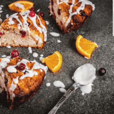Freshly baked air fryer cranberry scones with golden edges and cranberries
