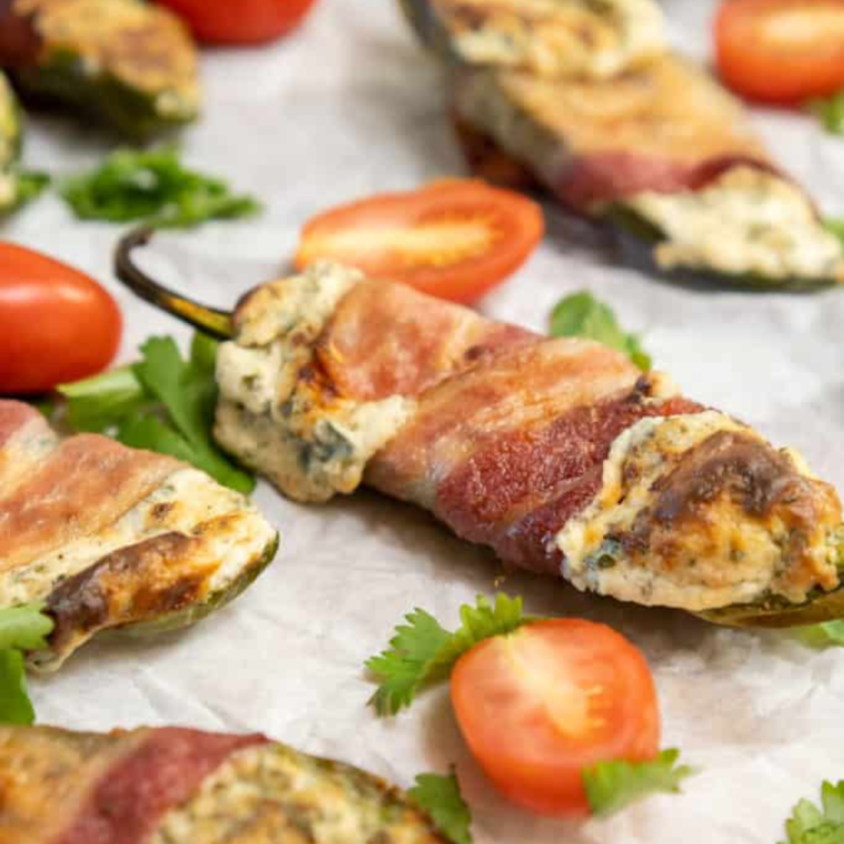 Experimenting with recipe variations for Air Fryer Jalapeño Poppers can add an exciting twist to this classic appetizer. Here are some creative ideas to try: Air Fryer Bacon-Wrapped Poppers: One of the most popular is bacon jalapeño poppers. For added flavor and texture, wrap each stuffed jalapeño with a strip of thick-cut bacon before air frying. The bacon adds a smoky, savory element. Buffalo Chicken Poppers: Mix shredded cooked chicken with buffalo sauce into the cream cheese filling for a spicy kick and a nod to buffalo chicken wings. Vegetarian Poppers: Replace the cheese with a vegan cheese alternative and add finely chopped vegetables like bell peppers or mushrooms to the filling for a vegetarian version. Crab Stuffed Poppers: Add some cooked, finely shredded crab meat to the cream cheese mixture for a seafood twist on the classic popper. Tex-Mex Poppers: Mix in taco seasoning, a small amount of salsa, and a blend of cheddar and Monterey Jack cheeses into the cream cheese for a Tex-Mex flair. Sweet and Spicy Poppers: Add a spoonful of pineapple or mango salsa and 1 tablespoon of jalapeño juice to the cheese filling for a sweet and spicy combination. Three-Cheese Poppers: Combine cream cheese, shredded cheddar, onion powder, and mozzarella or Parmesan for a more complex cheese flavor. Greek Style Poppers: Mix feta cheese, spinach, and a bit of dill into the filling for a Mediterranean-inspired variation. BBQ Poppers: Brush the stuffed poppers with your favorite BBQ sauce before air frying for a tangy and sweet finish. Italian Poppers: Add chopped sun-dried tomatoes, basil, and mozzarella to the cream cheese filling for an Italian twist. Each variation has a unique flavor and can be tailored to different tastes and occasions. Feel free to get creative and experiment with different fillings and toppings to discover your favorite version of Air Fryer Jalapeño Poppers! Pro Tips