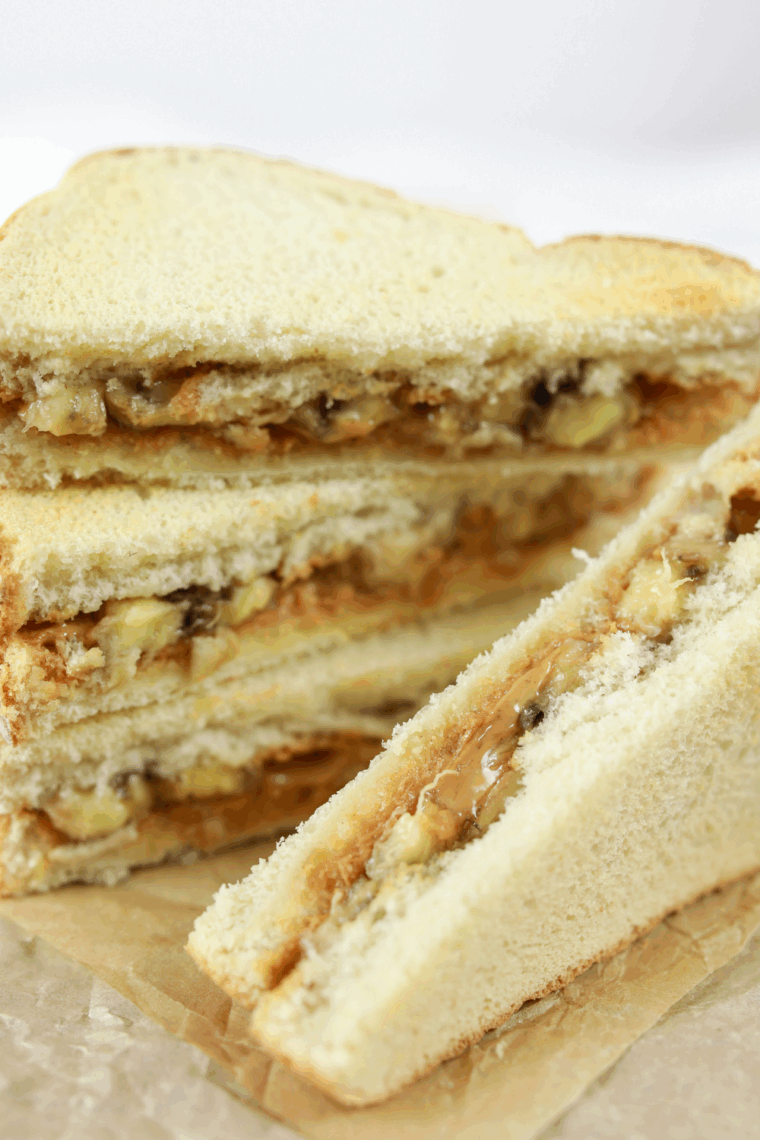 Air Fryer Peanut Butter and Banana Sandwich with golden crispy bread and melted peanut butter and banana filling.