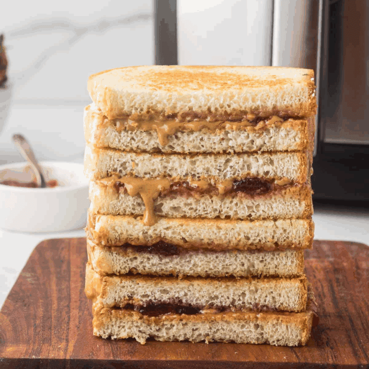 plate of air fryer peanut butter and jelly sandwich.