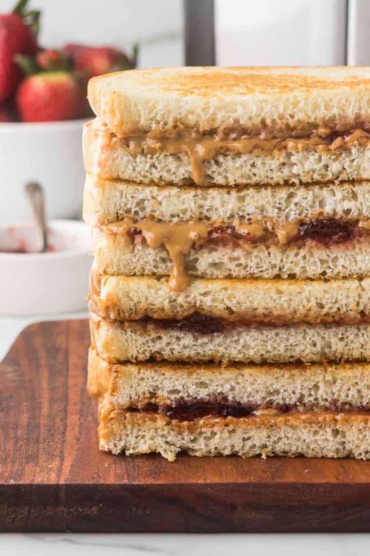 Plate of air fryer peanut butter and jelly sandwiches.