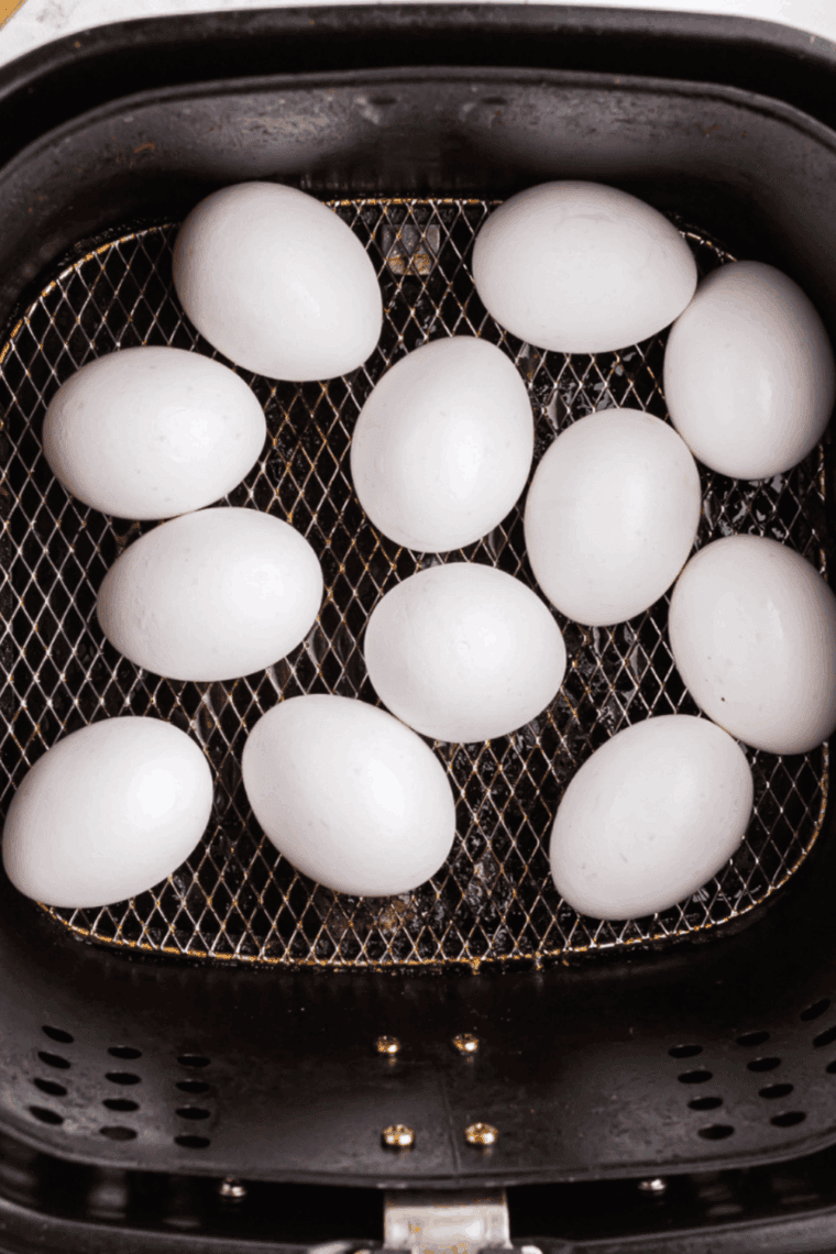 Place eggs in the air fryer basket and cook at 270°F for 16–17 minutes to achieve perfect hard-boiled eggs.