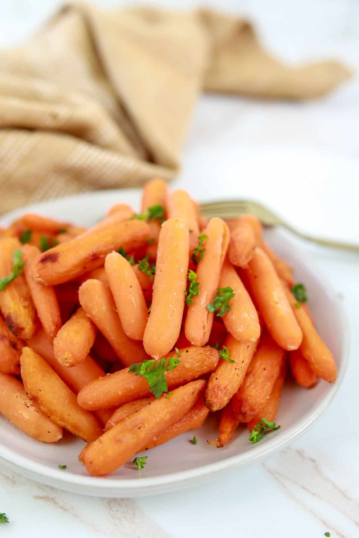 Air Fryer Honey Roasted Carrots on a white dish