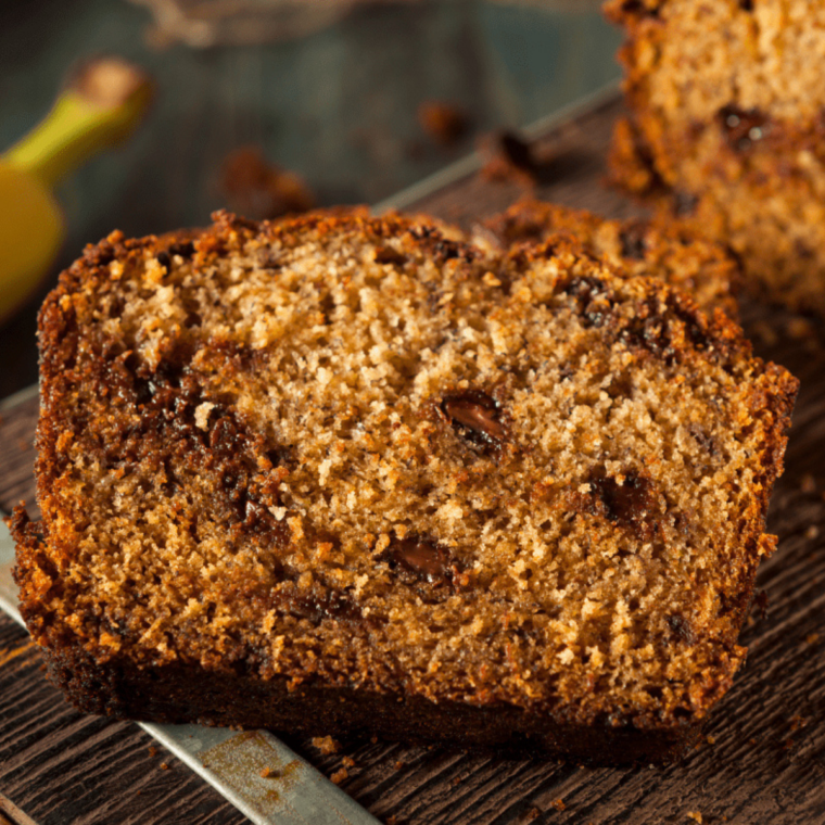 Sliced air fryer chocolate chip banana bread cooling on wire rack
