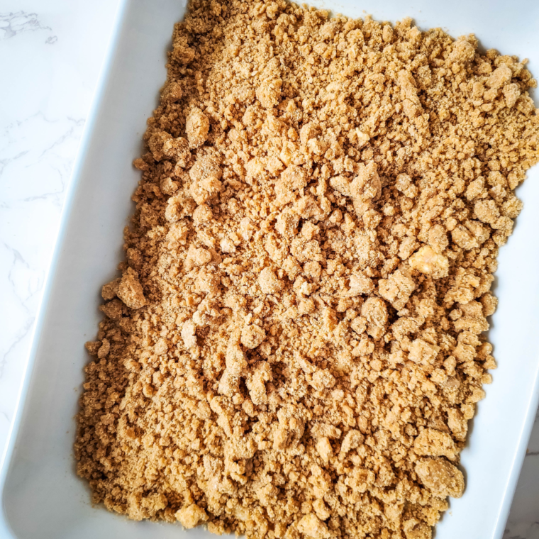 Placing the coffee cake in the air fryer basket at 350°F for 18-20 minutes, until cooked through.