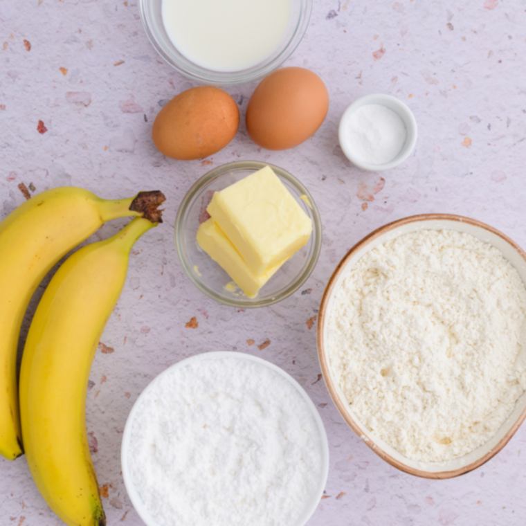 Greased 9x5-inch loaf pan ready for banana bread baking