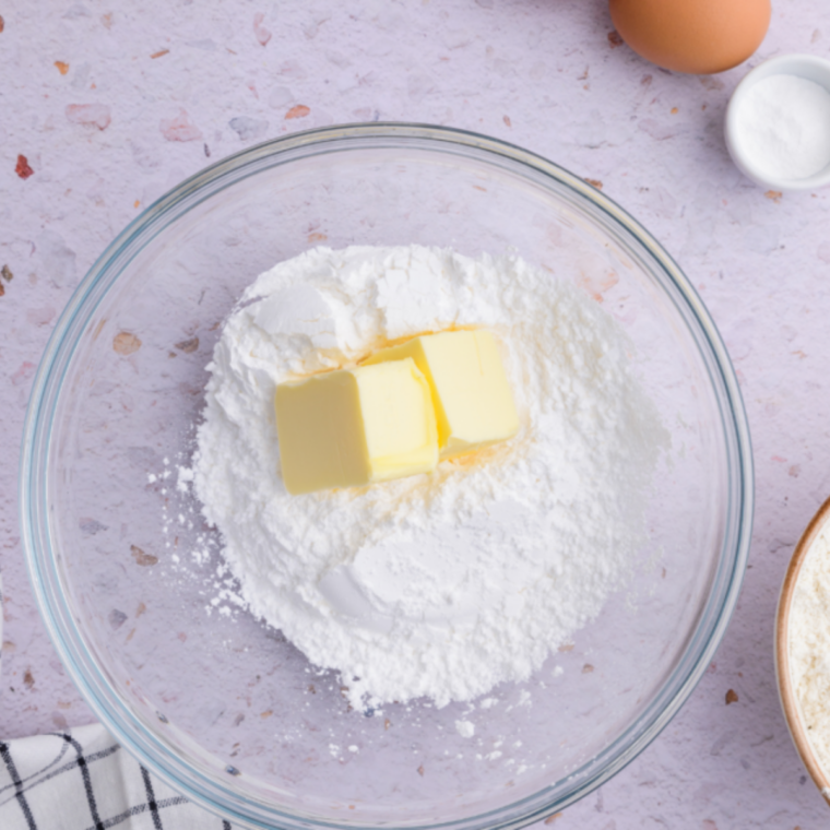 Mashing 3&ndash;4 very ripe bananas in a large mixing bowl