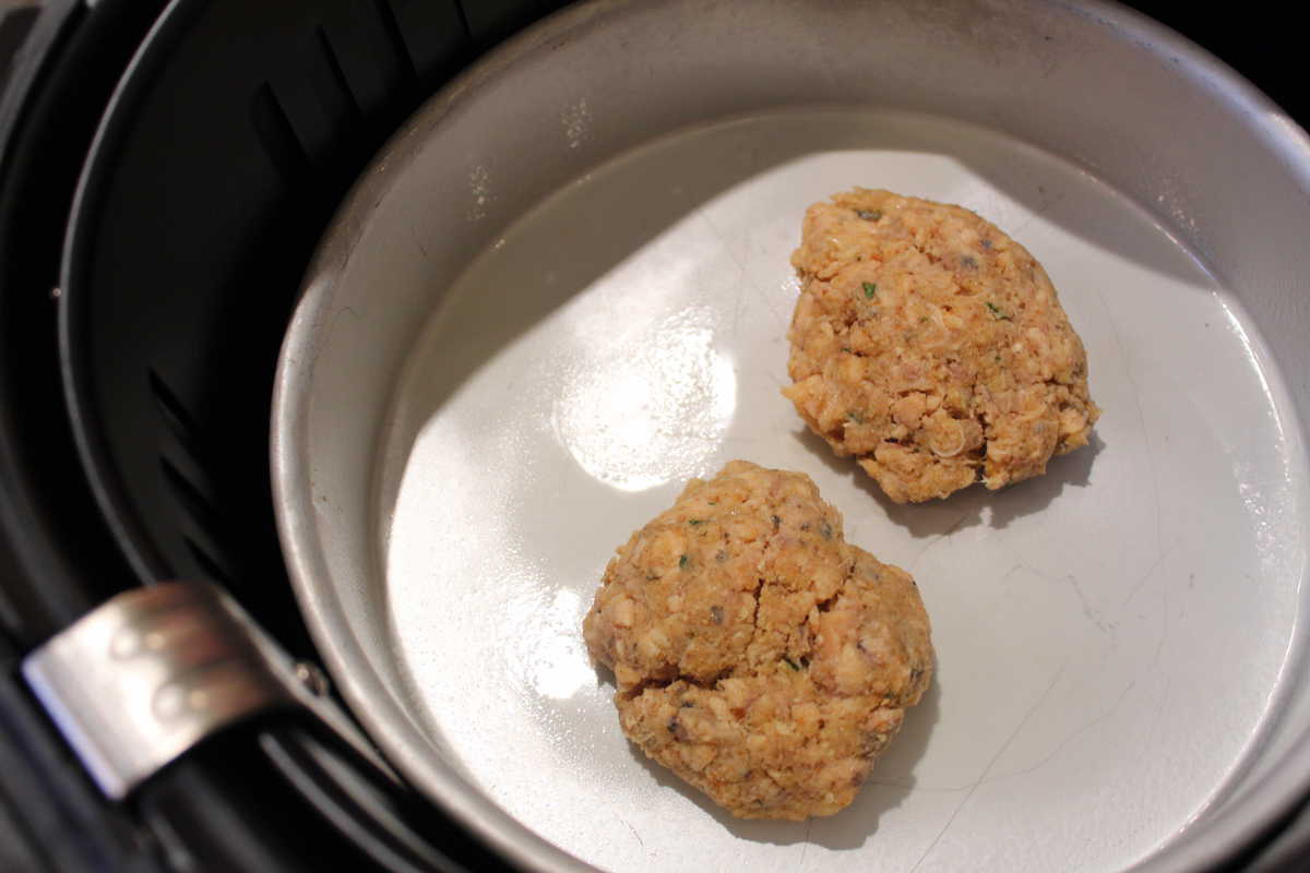 Add the salmon patties to the air fryer