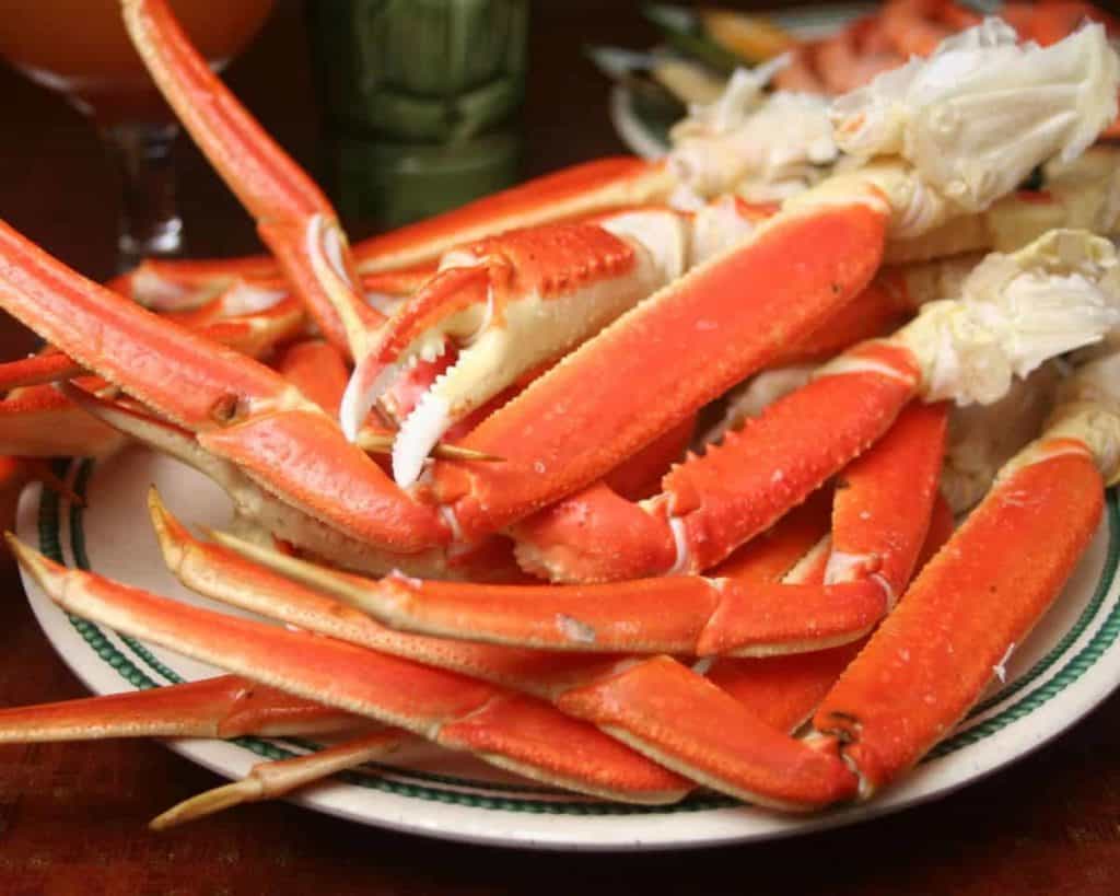 Crab legs in the Instant Pot ready to be pressure cooked.