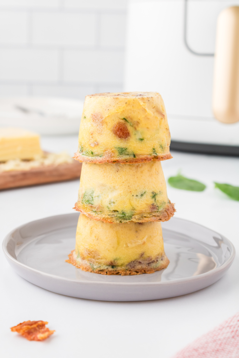 Keto Egg Bites Instant Pot on a plate, stacked.