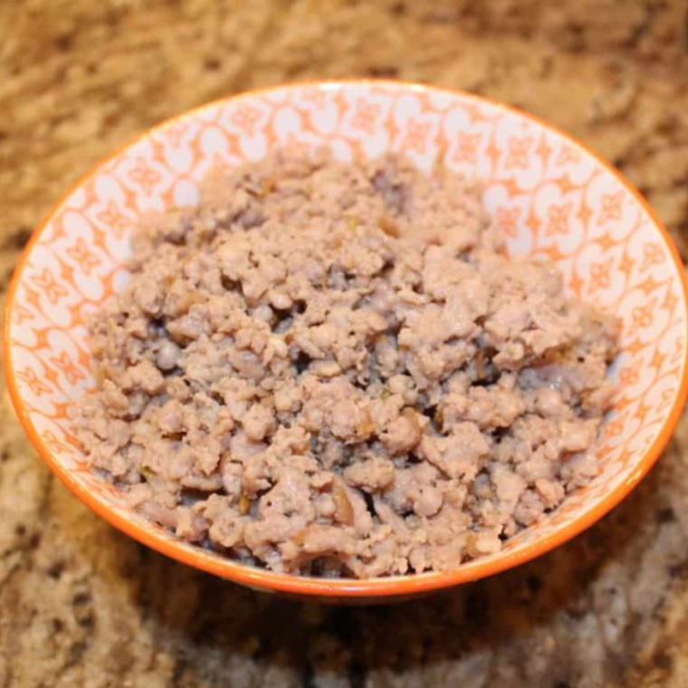 A shot showing the cooked sausage in a small bowl.