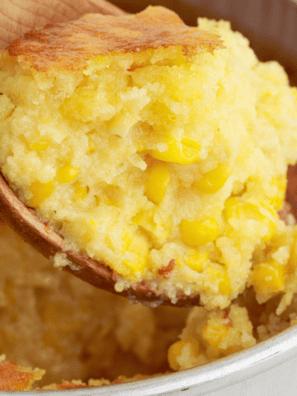 Make a quick and easy Air Fryer Corn Casserole that's perfectly fluffy and loaded with flavor! This savory dish is made in the air fryer, making it a fast and convenient side for any meal.