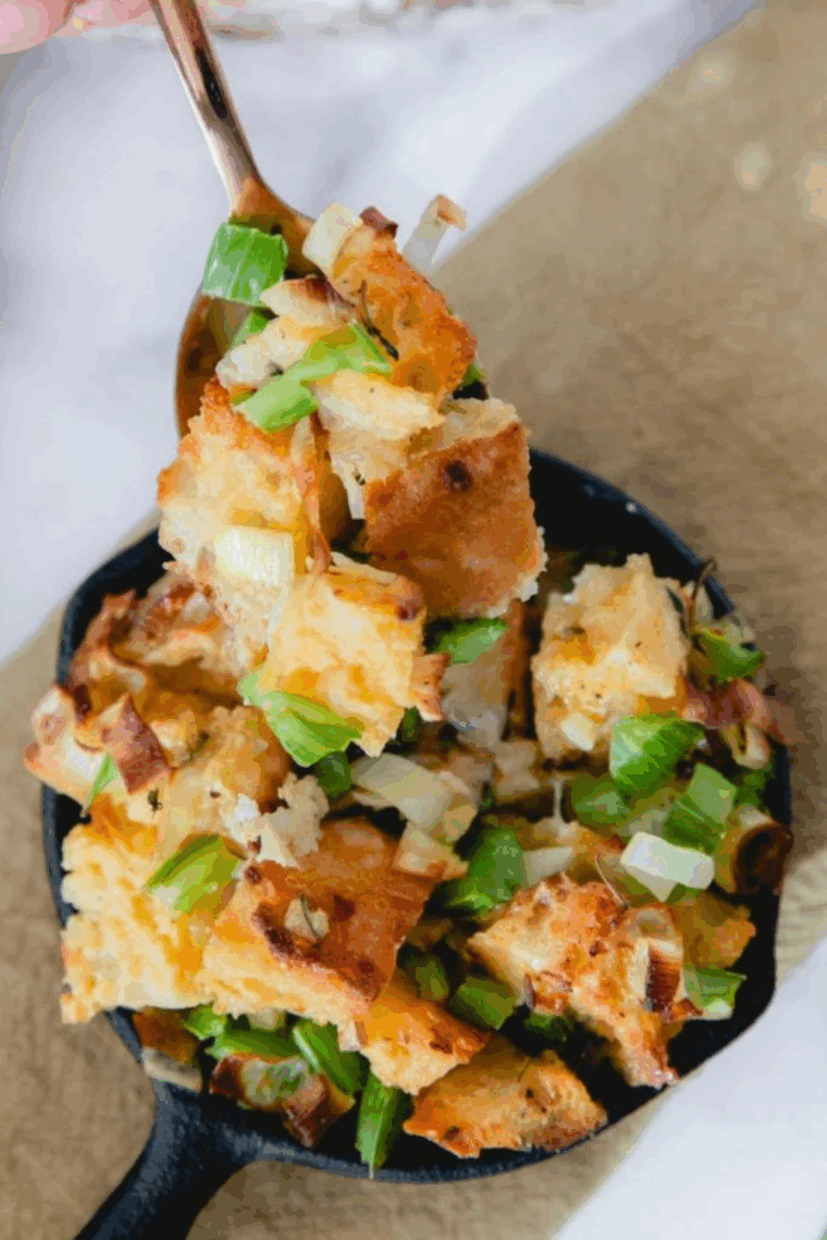 golden air fryer cornbread dressing in a baking dish ready to serve