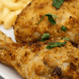 Air fryer Kentucky Kernel fried chicken drumsticks with a crispy golden coating on a white plate